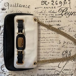 Michael Kora going out purse
